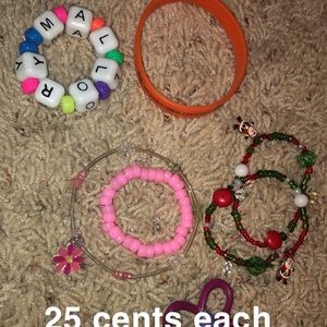 Bracelets, plastic animals, bouncy balls,